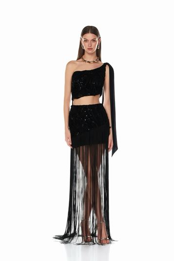 Abito da sera nero monospalla con paillettes e nappe